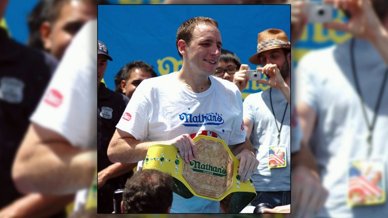 Defending hot dog eating champion sets new record