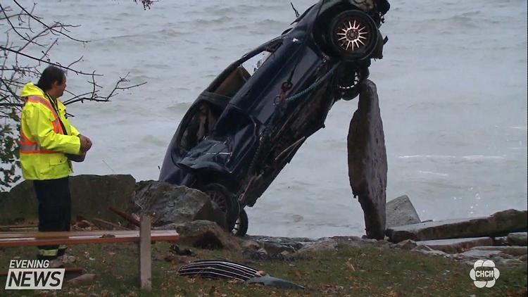 Body found after car plummets into Lake Ontario, man charged