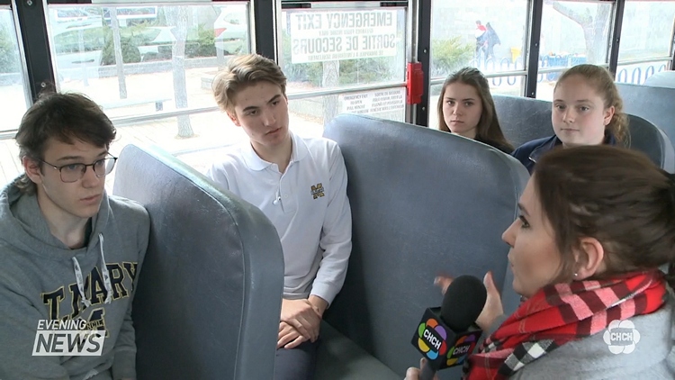 Students take the wheel after driver experiences medical emergency