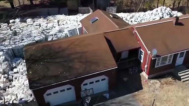 New Hampshire man ordered to remove thousands of boxes from yard