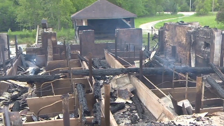 OPP and investigators from the Ontario Fire Marshals office are looking into a suspicious fire at a barn in Puslinch