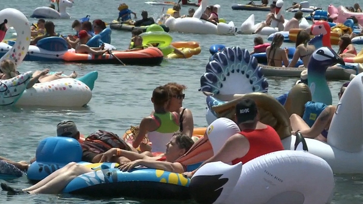 Families in Welland lounged and soaked up the sun in giant inflatable floaties