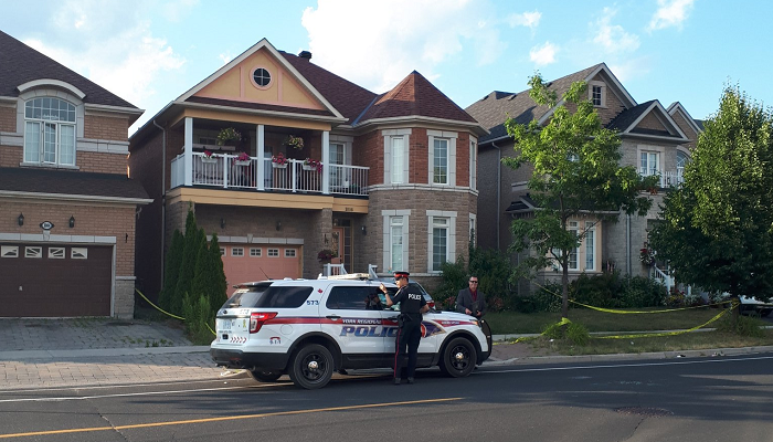 Man charged after 4 bodies found in Markham home