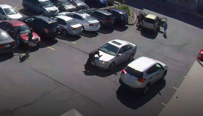 Bystander dragged by car after altercation in Hamilton parking lot