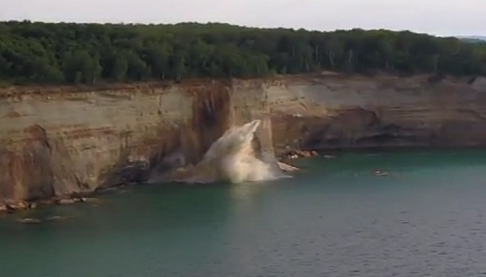 Kayakers narrowly escape cliff falling in Michigan