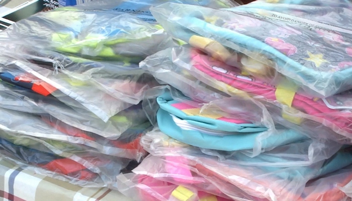 A church in Hamilton gave out five-hundred backpacks full of school supplies