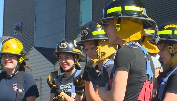 Young women get a glimpse into a career in firefighting