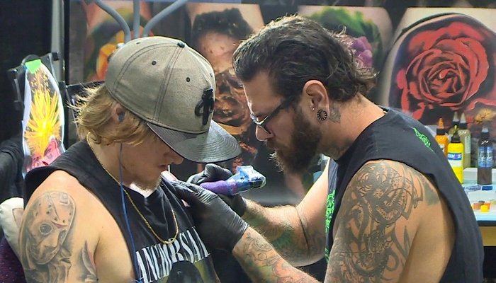 Hamilton gets inked with first tattoo expo