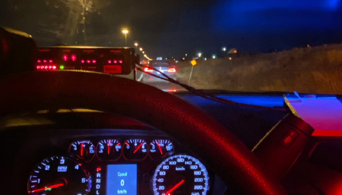 Tesla driver caught speeding while flossing teeth and using autopilot