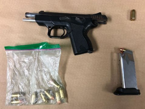 Two men arrested after driver brandishes handgun