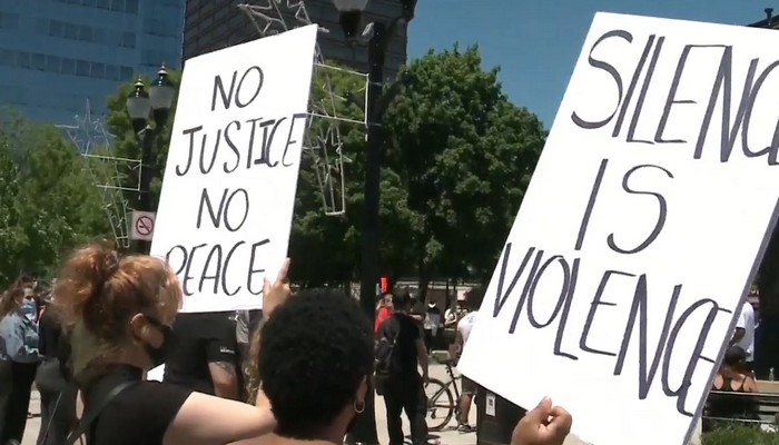 Hundreds rally outside Hamilton city hall