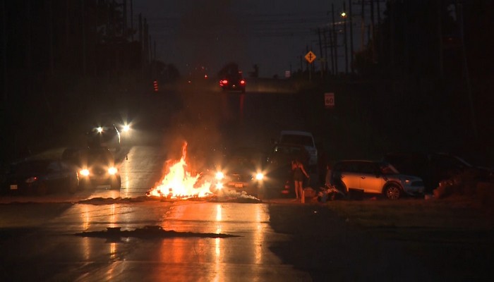 Fiery blockade continues into the night in Caledonia