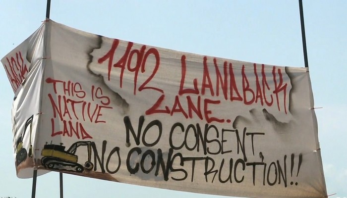 The court orders a permanent injunction against occupiers of a Caledonia housing development