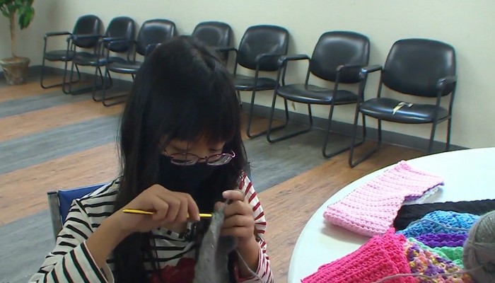 11-year-old Welland girl crochets 100 scarves to help the homeless