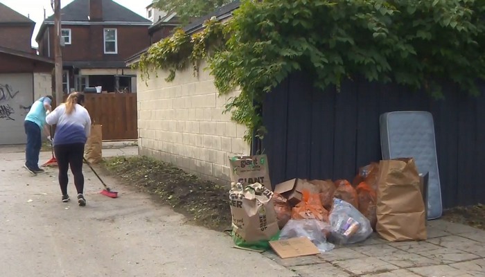 Volunteers unite to clean up local alleys in Hamilton