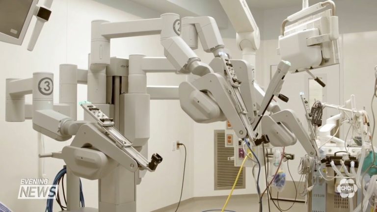 A robot is getting early lung cancer patients in and out of the operating room on the same day