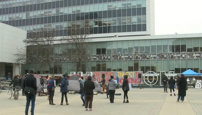 Protestors camp outside Hamilton City Hall vowing to stay until demands to defund police are met