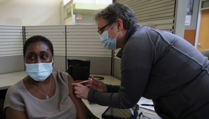 Long-term care workers in Hamilton receive the first doses of the Pfizer vaccine in the city