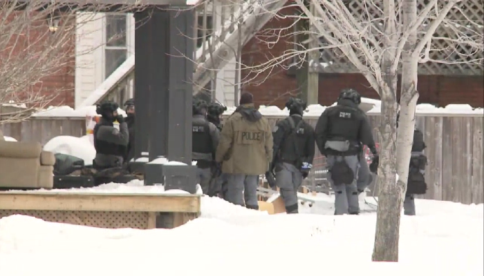 standoff Queenston St. and Lorne St.