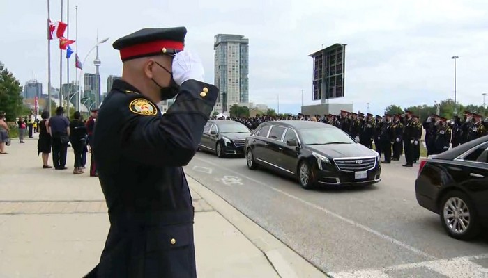 Thousands attend funeral service for a Toronto police officer killed in the line of duty last week