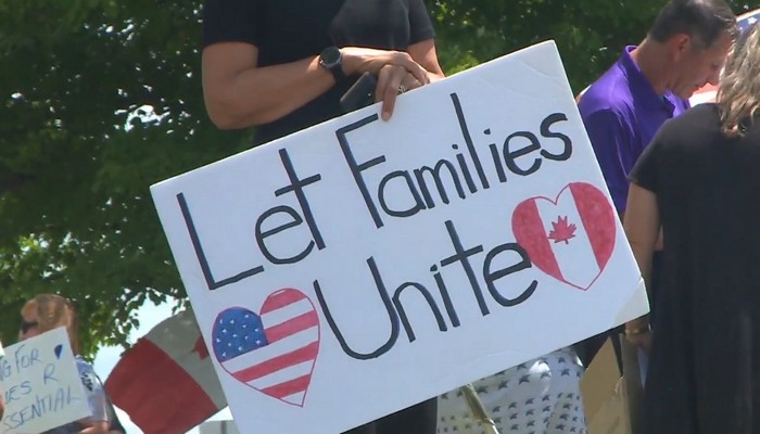 Families hold rally in Fort Erie in hopes to reunite with loved ones across the border