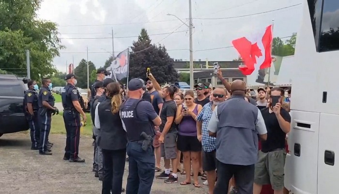 Trudeau says he won’t back down after he was once again greeted by protesters