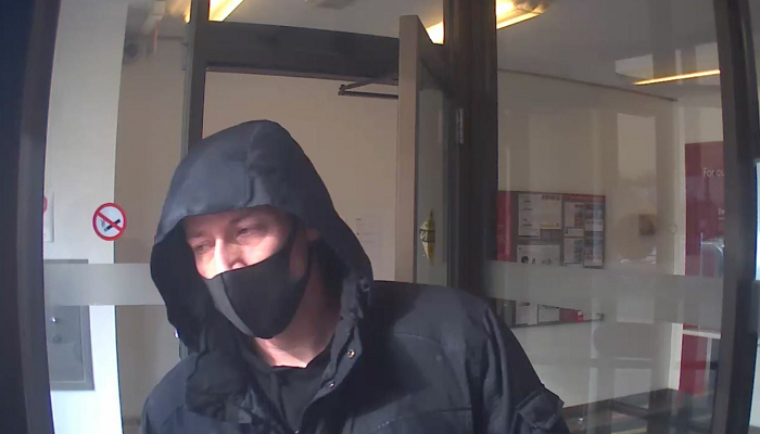 Police release new images of man wanted in Brantford bank robbery