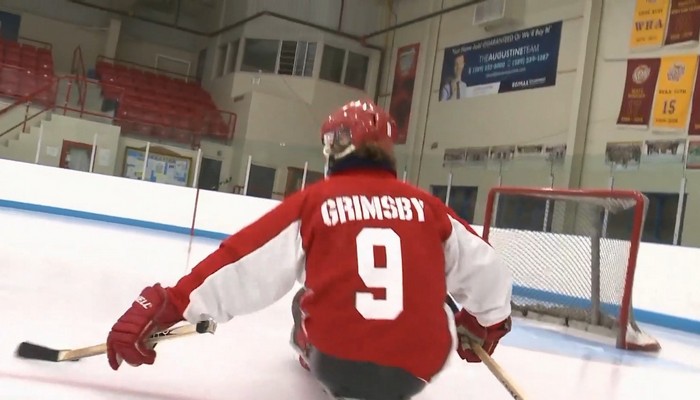 Local hockey player returns to the ice after a stroke