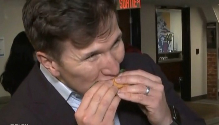 Sampling the food being served at the Grey Cup game