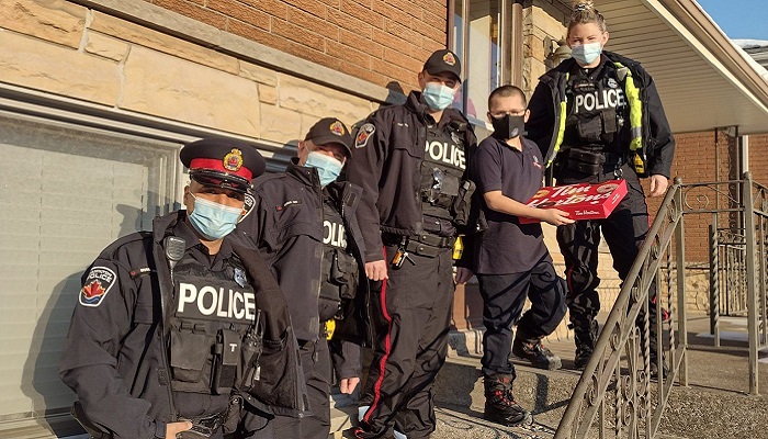 12-year-old boy gets special birthday delivery from Hamilton police officers