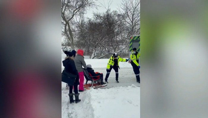 Neighbours use chair and sled to get woman to paramedics during winter storm