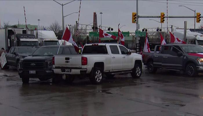 Ambassador Bridge border crossing reopens after police remove protesters