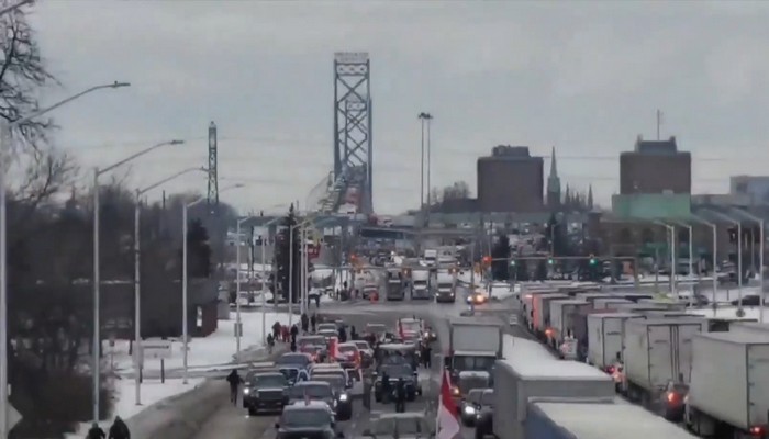 Protesters block Canada-bound traffic on the Ambassador Bridge