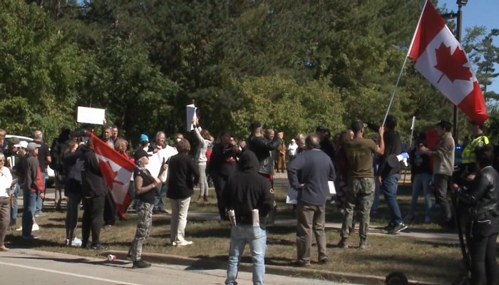 Protest held over Oakville Trafalgar high school teacher’s large prosthetic breasts