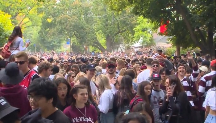 Volunteers clean up after rowdy street gatherings near McMaster University