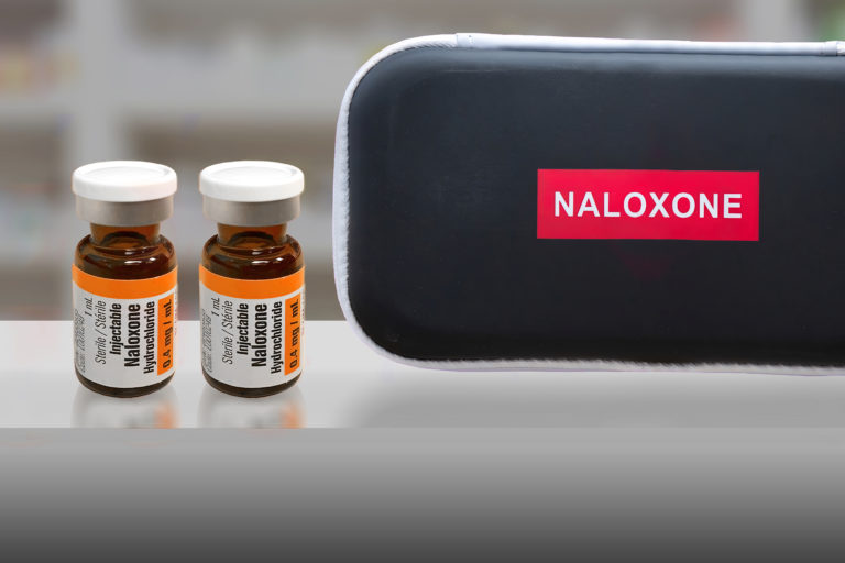 A Naloxone kit with a couple of vials at pharmacy