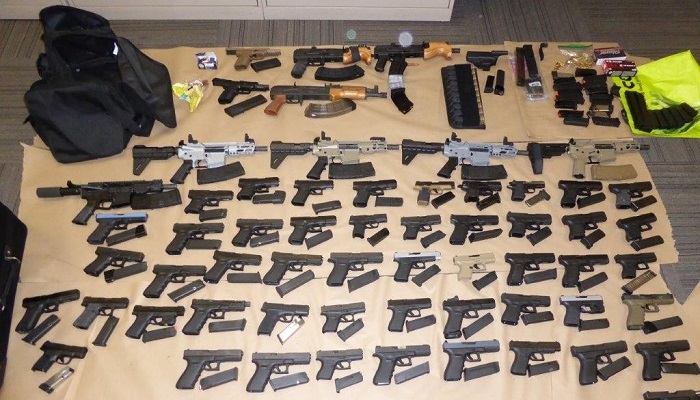 Toronto police charge 6 people, seize 62 firearms after investigation