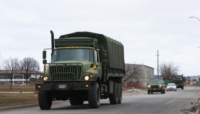 Canadian Army vehicles on Hamilton highways for training