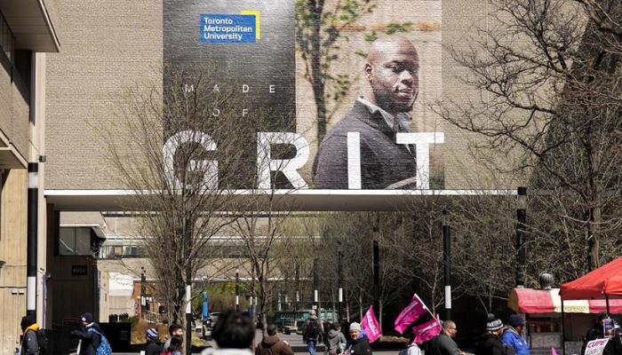 Students make their way around the renamed Toronto Metropolitan University (TMU), formerly known as Ryerson University in Toronto on Wednesday, April 26, 2023.