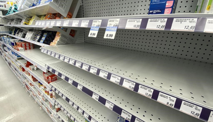 Empty shelves of children's pain relief medicine are seen at a Toronto pharmacy, Wednesday, August 17, 2022.