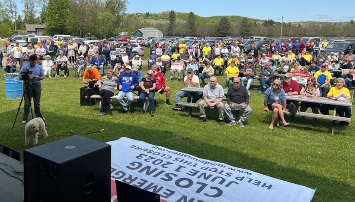 People attend a rally against the planned closure of an emergency department in the central Ontario community of Minden, on Sunday, May 21, 2023.