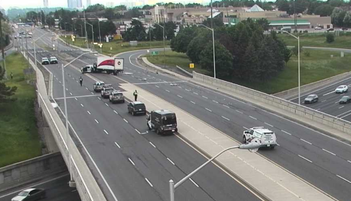 Police officer seriously injured in collision with Canada Post truck