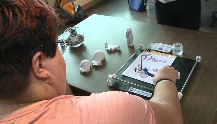 Hamilton woman with limited mobility dedicates paintings to people with disabilities