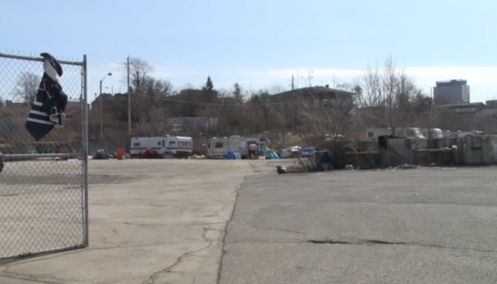 RVs and trailers on empty north end lot told to leave