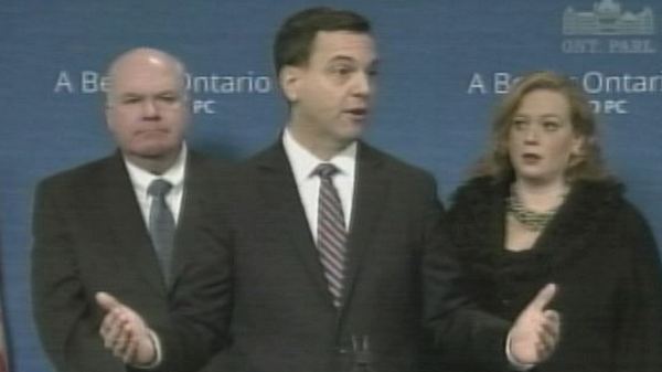 Ontario PC leader Tim Hudak, flanked by Jim Wilson and Lisa McLeod; November 25, 2013