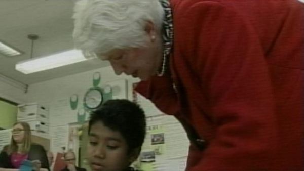 Liz Sandals talks to a student; January 8, 2014