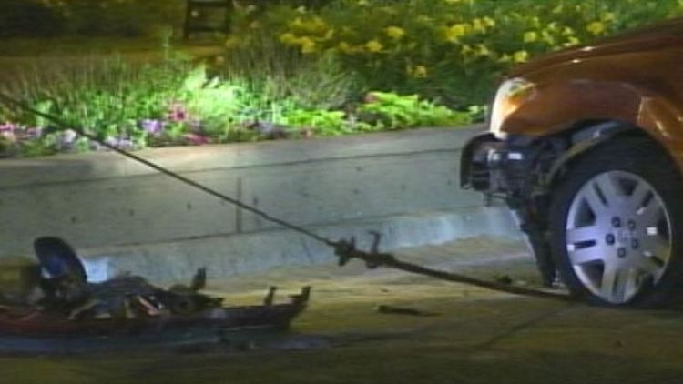 Damage left by a flipped SUV on Plains Rd, Burlington, July 1, 2014