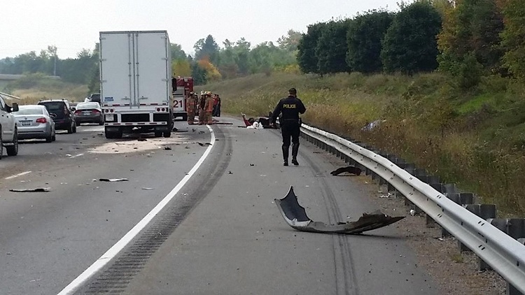 Wreckage of a collision between a car and a transport truck; Ancaster, October 2, 2014