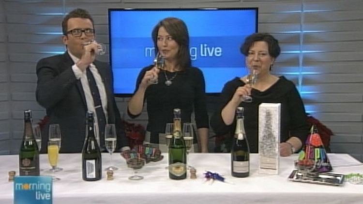 Tim Bolen, Lesley Stewart and Sylvia Giardino sample some champagne; Morning Live, December 29, 2014