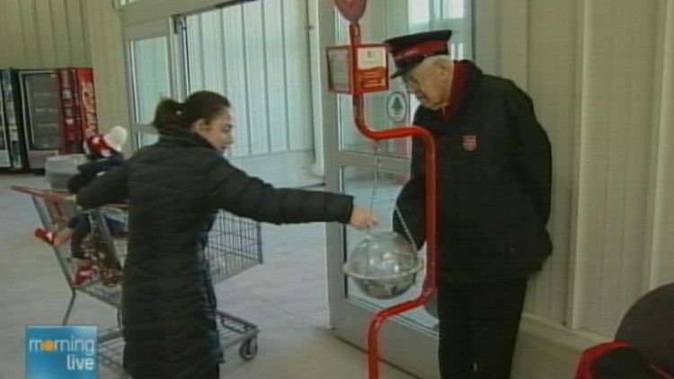 Archive image of woman contributing to the Salvation Army